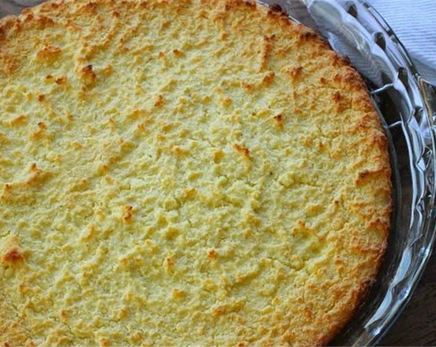 step 7 Transfer to a glass 9-inch round dish, spread evenly and bake for 45 minutes, until light brown on top. Let cool on a wire rack.