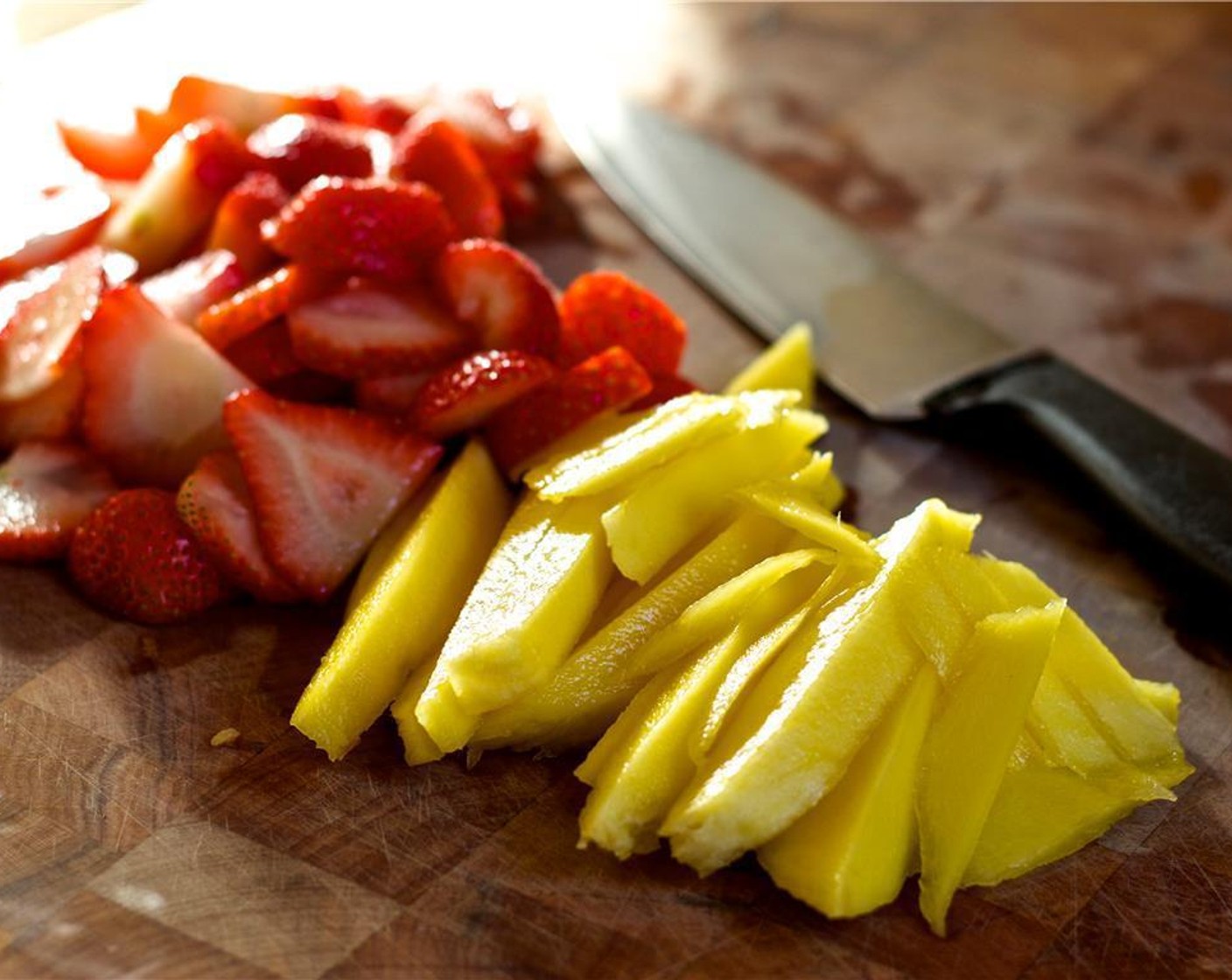 step 1 Wash and slice the Fresh Strawberries (8) into thin slices.  Peel and slice Mango (1) into matchsticks. Set aside. Slice the Fresh Mint Leaves (3 Tbsp).