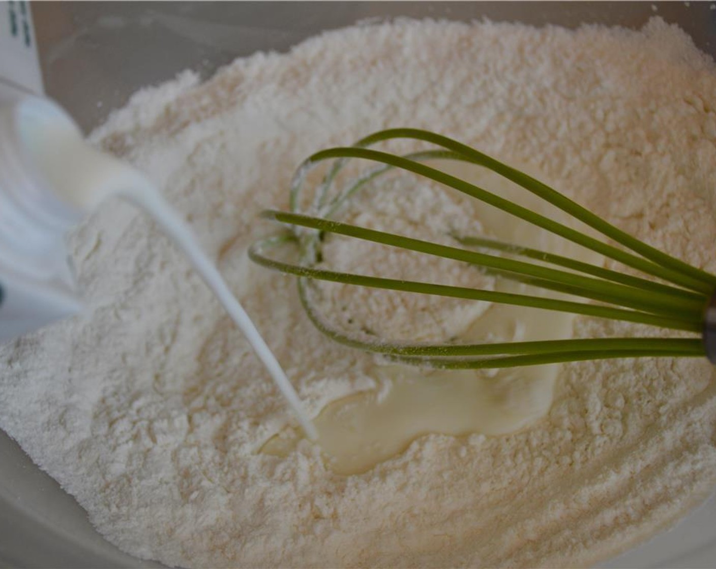 step 3 In a bowl, combine Corn Starch (1/2 cup) and Rice Flour (1/2 cup). Add Whole Milk (1 cup) to dissolve and whisk to form a thick mixture.