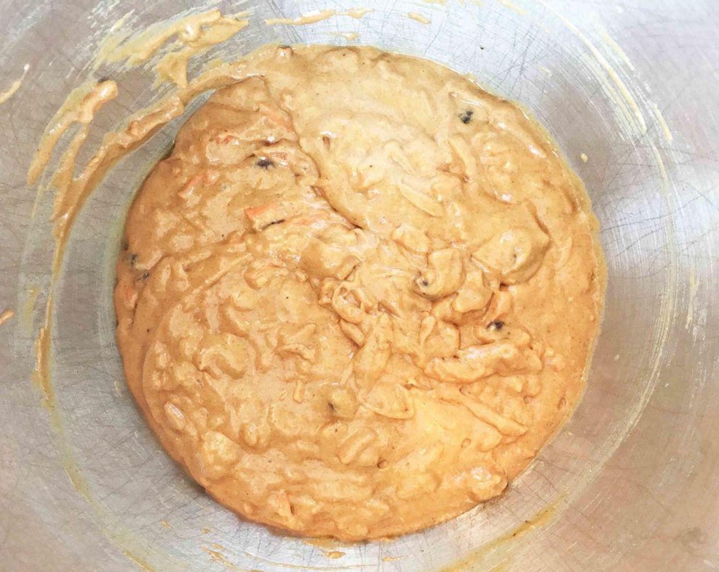 step 4 Mix together the Carrot Cake Mix (1 box), Water (1 cup), carrot, Fat-Free Vanilla Greek Yogurt (1/3 cup), Pineapples (4 Tbsp), Sun-Maid Raisins (4 Tbsp), and Farmhouse Eggs® Large Brown Eggs (2) whites.