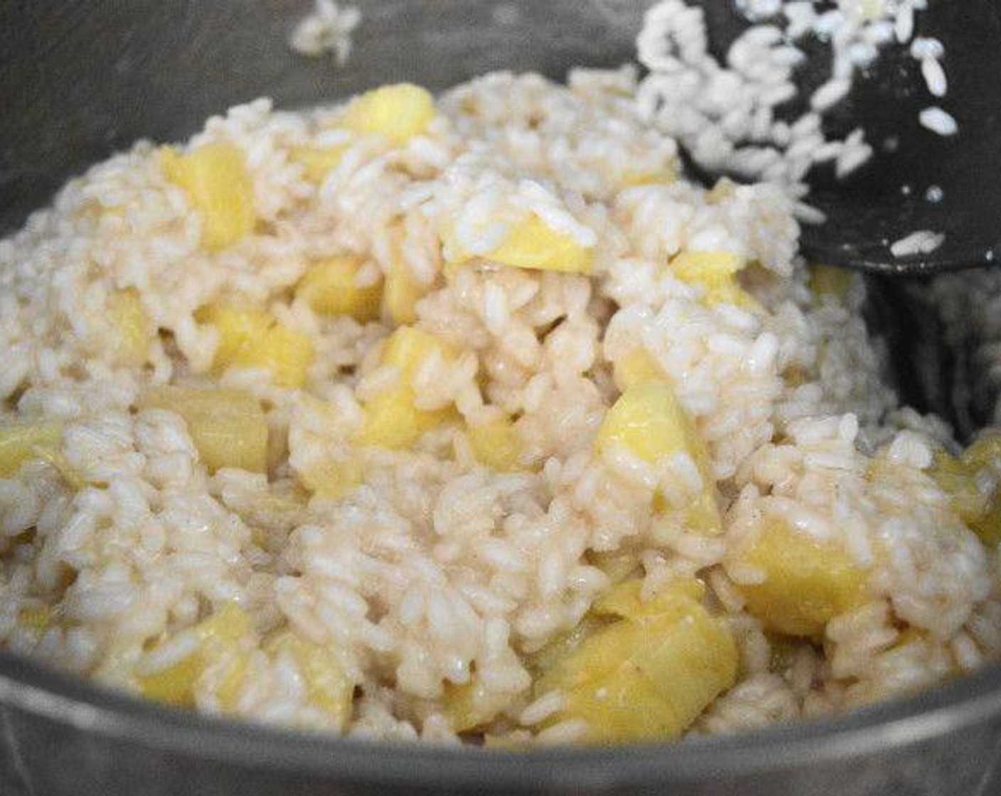 step 4 Ladle 1/3 of the chicken stock into the pan with the rice, then constantly stir while the rice absorbs that stock. Repeat with the next third of stock, still stirring constantly. Once that is absorbed add in the remainder of the stock and let the rice get fully cooked and tender while you still stir.