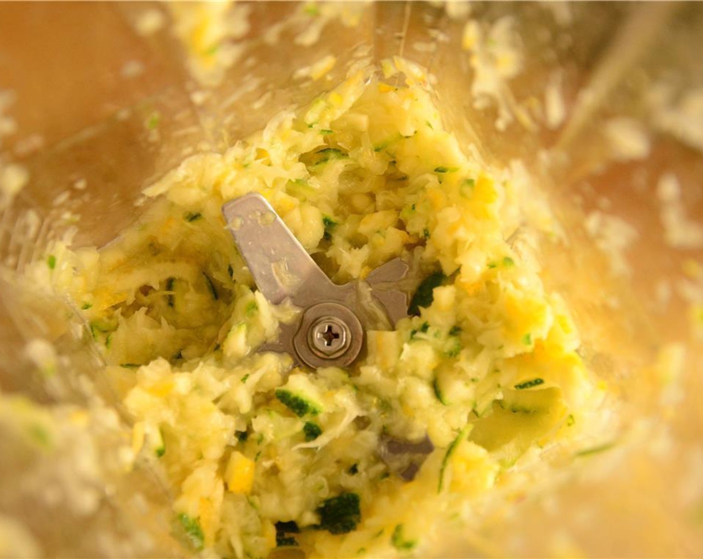 step 4 Place the lemon and lime into the blender. Blend until fine.