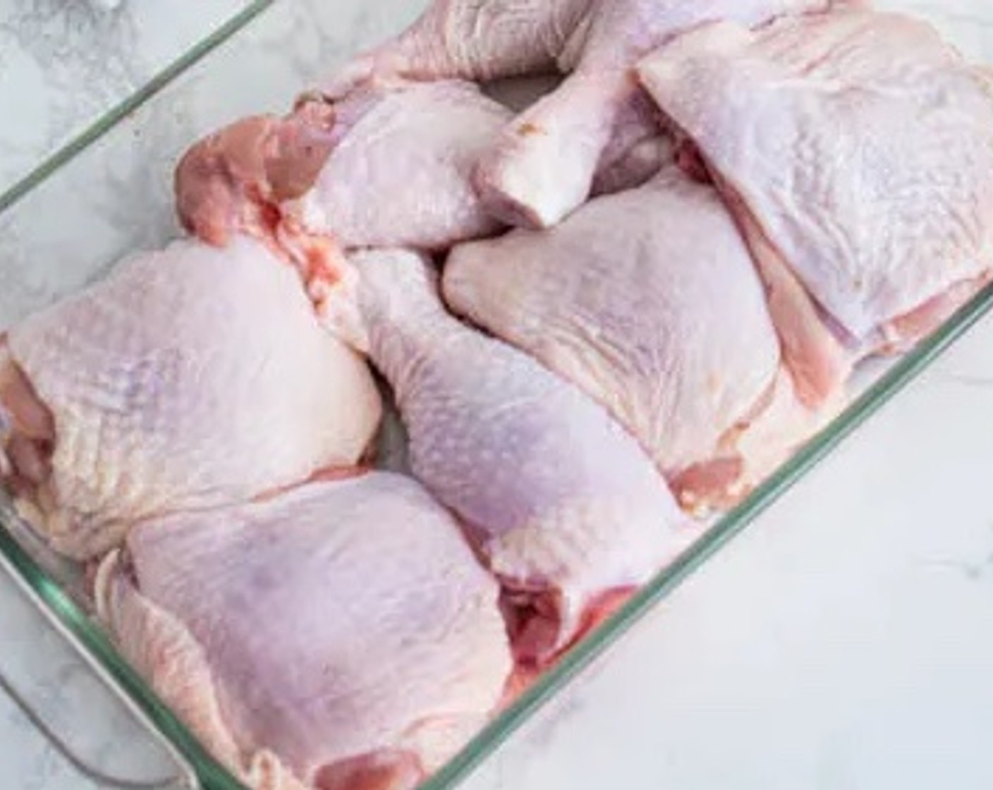 step 2 Pat the Skin-On Chicken Thighs (2 lb) dry with a paper towel.