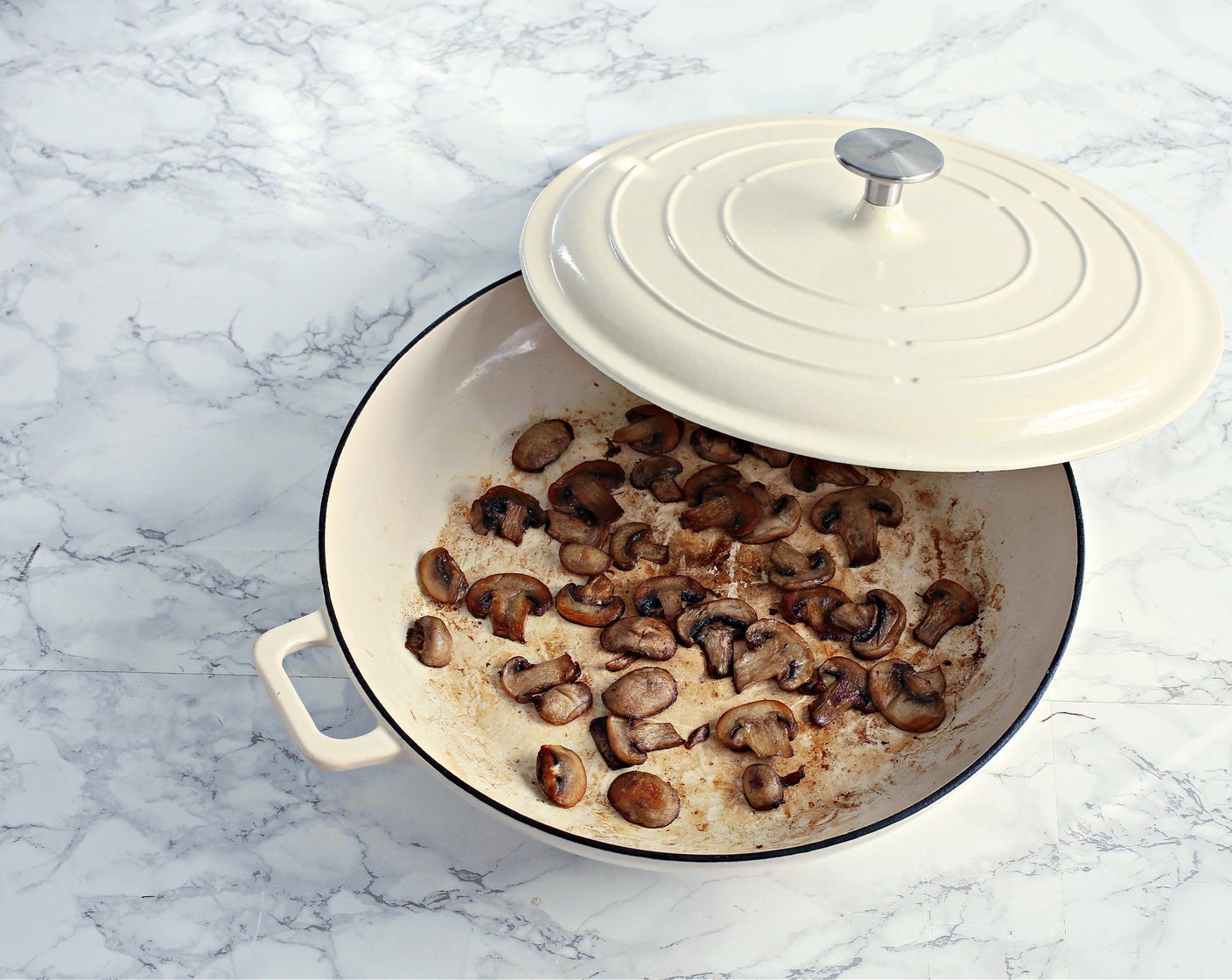 step 1 Add Butter (2 Tbsp) to a soup pot along with the White Mushrooms (2 1/3 cups). Cook over medium-low heat, stirring occasionally until the mushrooms are golden brown.