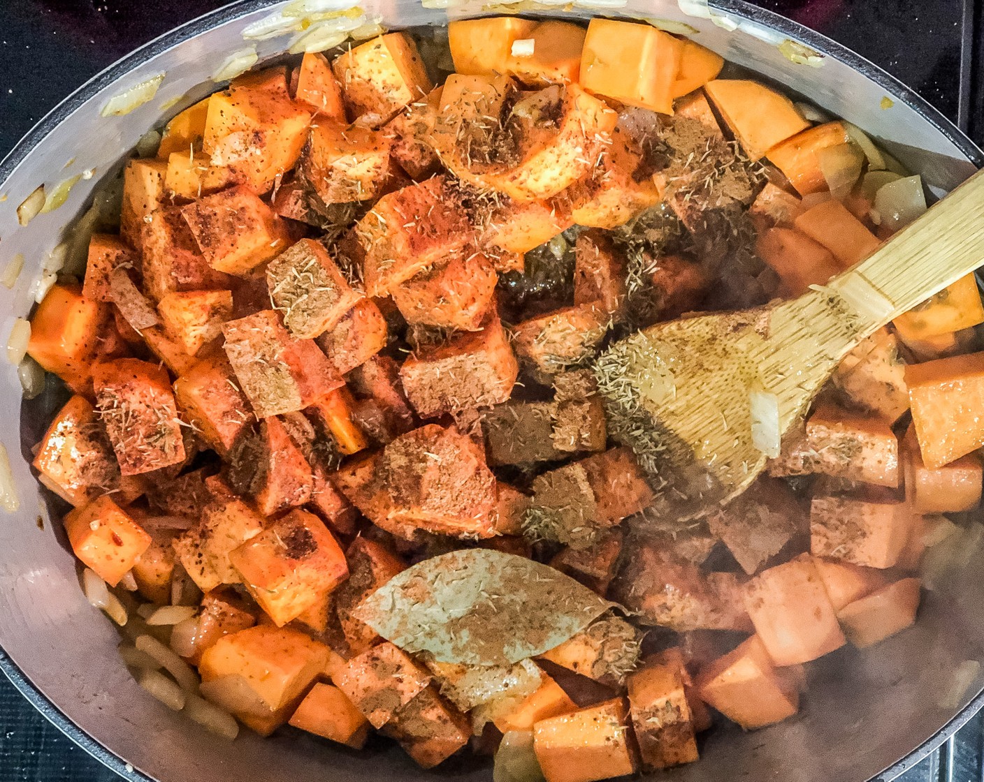 step 3 Add the Dried Thyme (1 tsp), Ground Cinnamon (1 tsp), Ground Nutmeg (1/2 tsp), and Bay Leaf (1). Add the Unsalted Chicken Stock (8 cups) and Thai Red Curry Paste (1/3 cup), bring to a boil, cover, reduce the heat to low, and cook for 20 minutes.