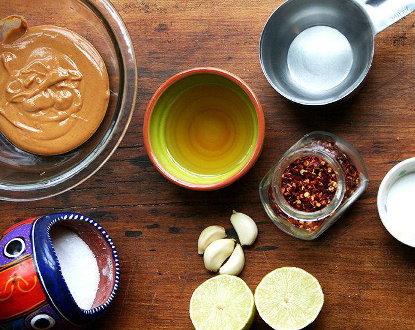 step 3 Place the Peanut Butter (1/3 cup) in a bowl and whisk in the {@10:} until blended. Stir in Apple Cider Vinegar (1/4 cup), Granulated Sugar (1 Tbsp), Kosher Salt (1/2 Tbsp), Garlic (3 cloves), Crushed Red Pepper Flakes (to taste), the juice from Lemon (1), Sesame Oil (1 Tbsp), Sriracha (to taste), Hot Sauce (to taste). Taste.