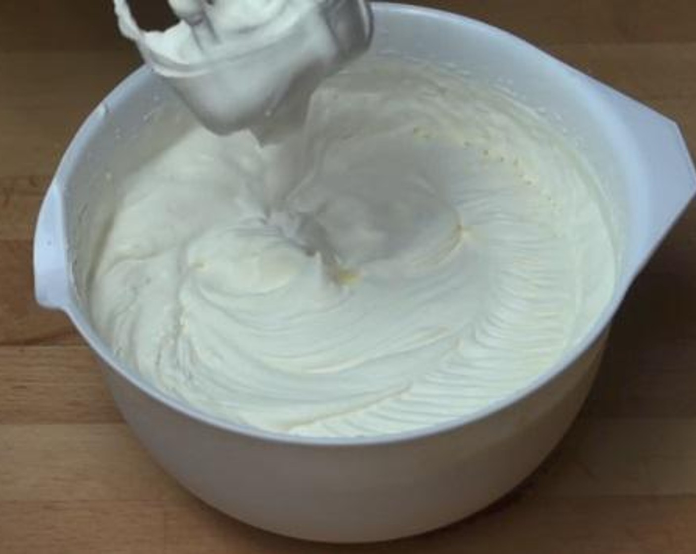 step 3 In another mixing bowl, add and whip together the Cream (3 3/4 cups), Caster Sugar (1 Tbsp), and Vanilla Extract (1 tsp).