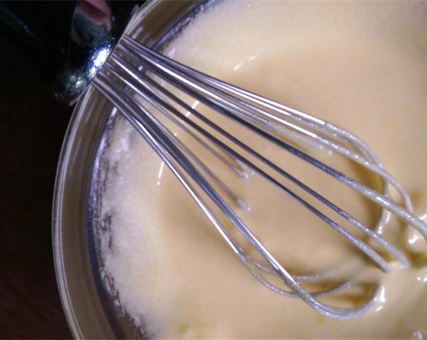 step 2 In a bowl, whisk Eggs (4) with Granulated Sugar (3/4 cup) and Salt (1 pinch) until they are fluffy and pale yellow in color.