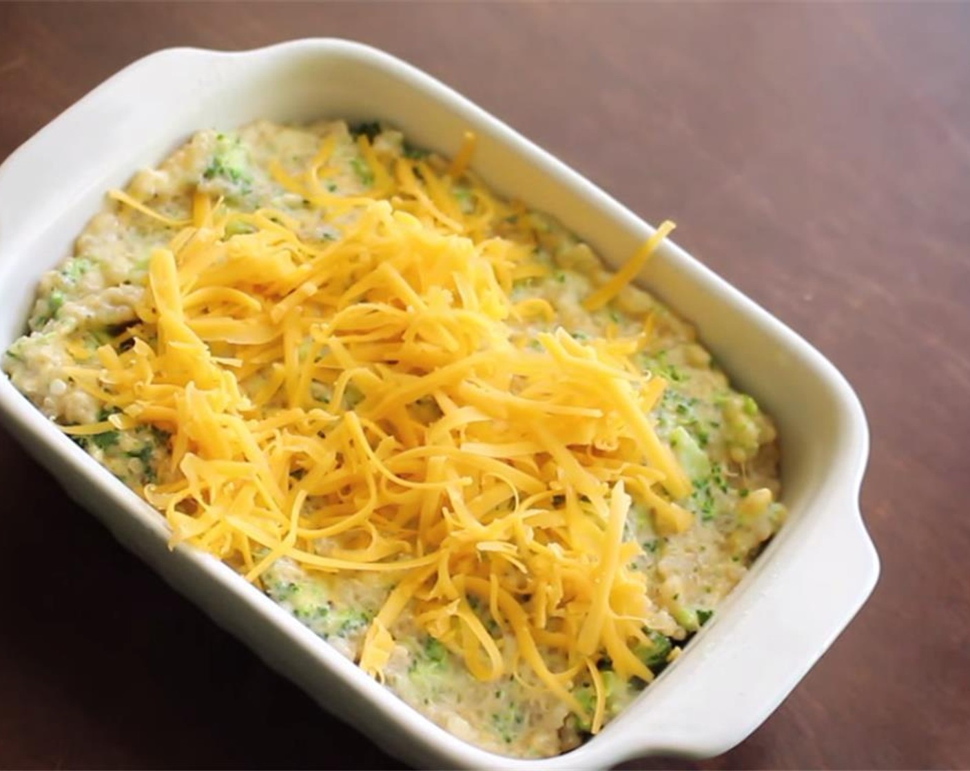 step 8 Transfer to a casserole dish, cover with more cheese.