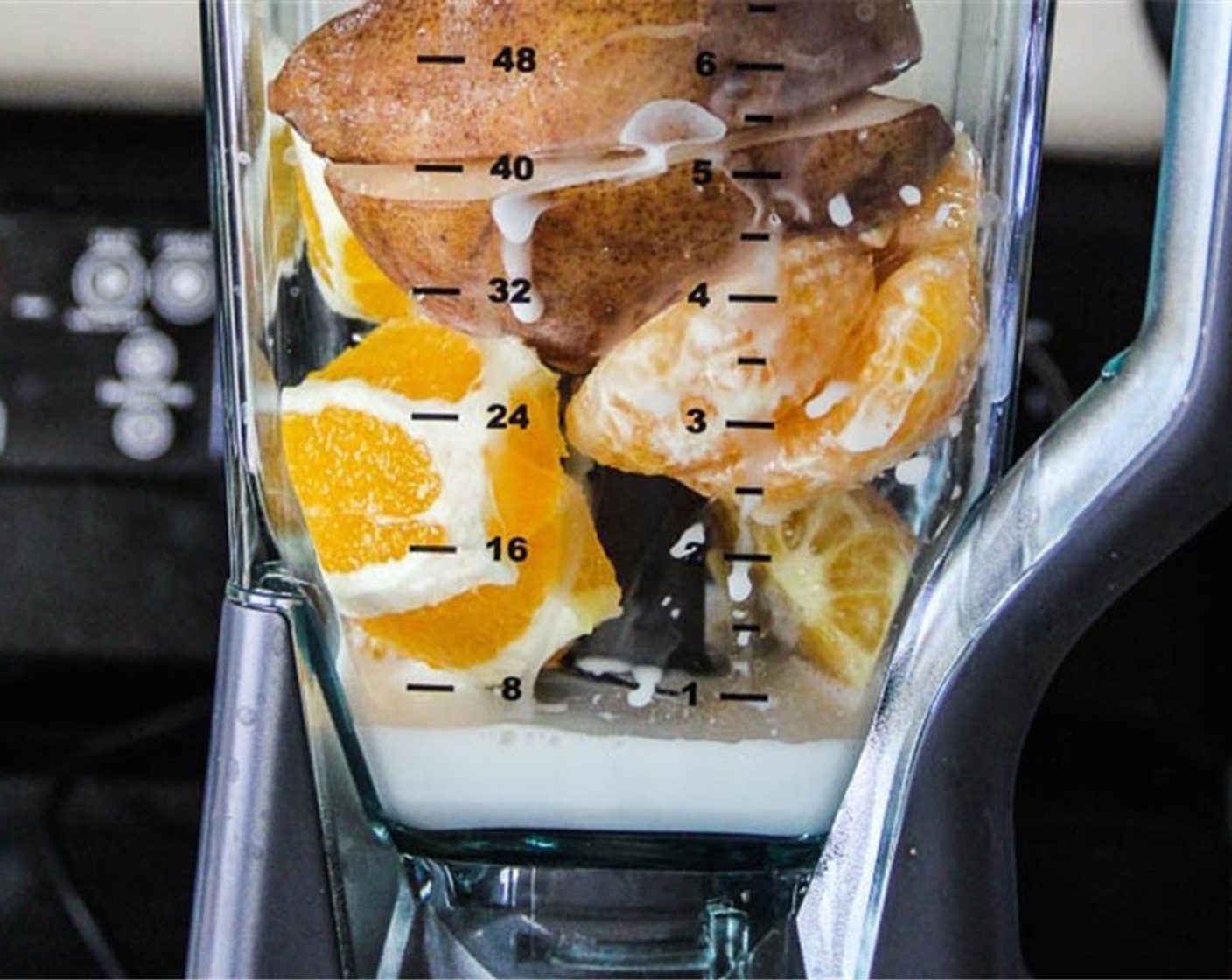 step 1 Blend the Oranges (2), Pear (1/2), and Vanilla Coconut Milk (1/2 cup) in a blender until smooth.