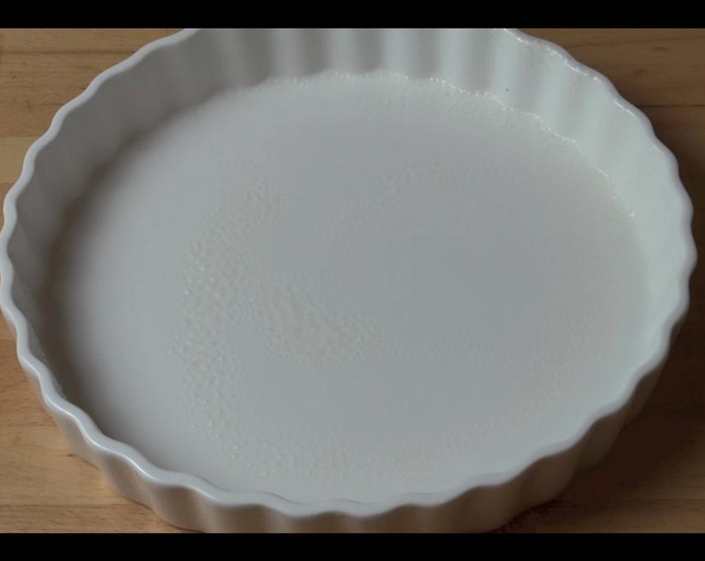 step 5 Grease a large pie plate.