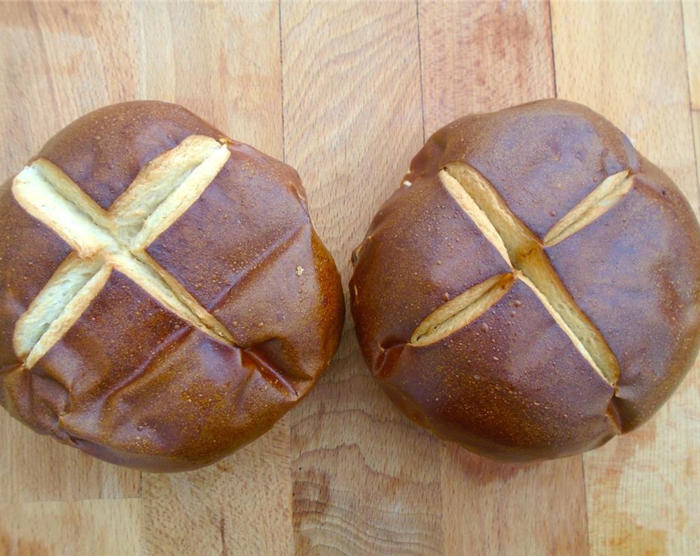 step 10 Meanwhile, cut the Pretzel Buns (2) in halves.