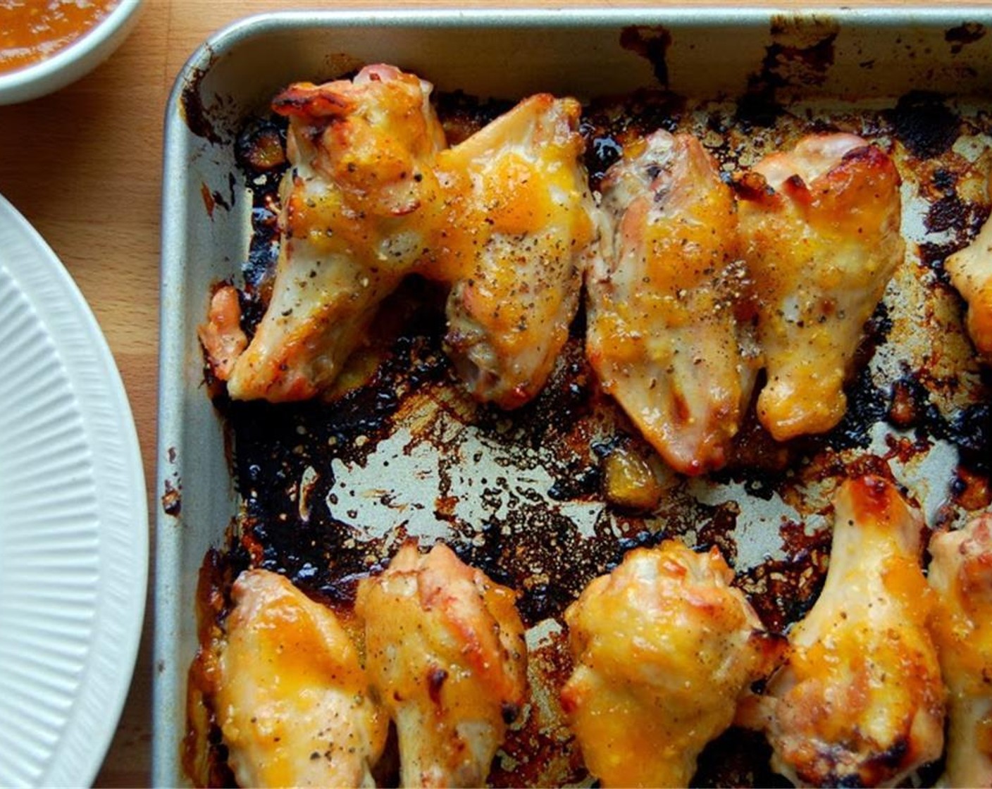 step 5 Place under the broiler. Broil on high for 3 minutes. Take out of the oven and flip the wings over.  Put back in the oven and broil for 3 minutes longer.