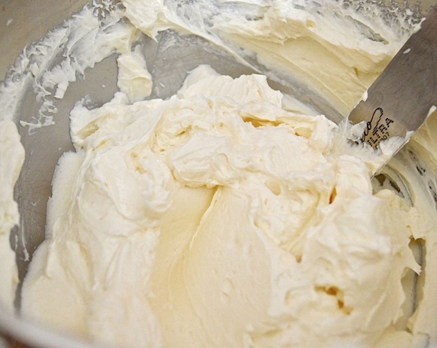 step 7 Transfer it into the stand mixer bowl and use the whisk attachment to whip it up to be stiff peaks for a few minutes. It should be white and shiny.