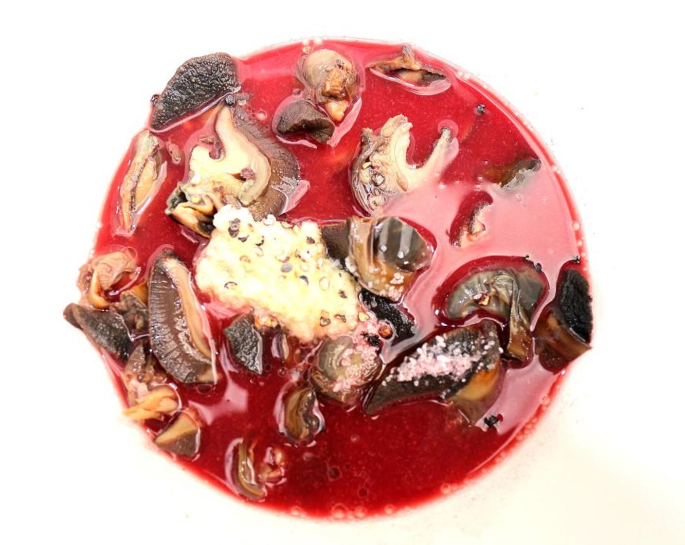 step 2 Marinate snails overnight in Red Wine (1/2 cup), Garlic Paste (1 tsp),Freshly Ground Black Pepper (1/2 tsp) and Kosher Salt (to taste).
