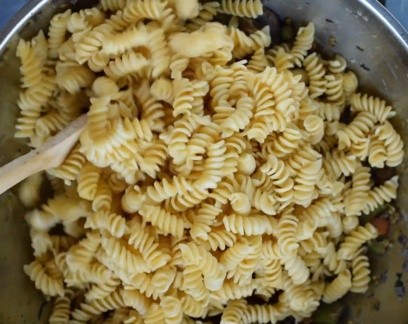 step 8 Add the cooked Pasta (1 lb). Mix it all together so that the pasta coats well with the masala. Adjust the salt as needed.