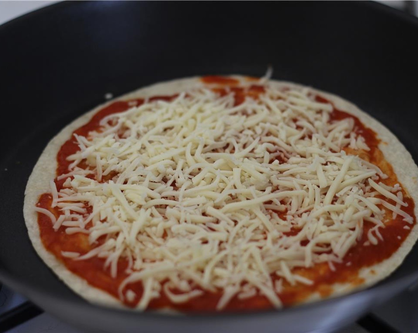 step 2 Add Shredded Mozzarella Cheese (1/4 cup).