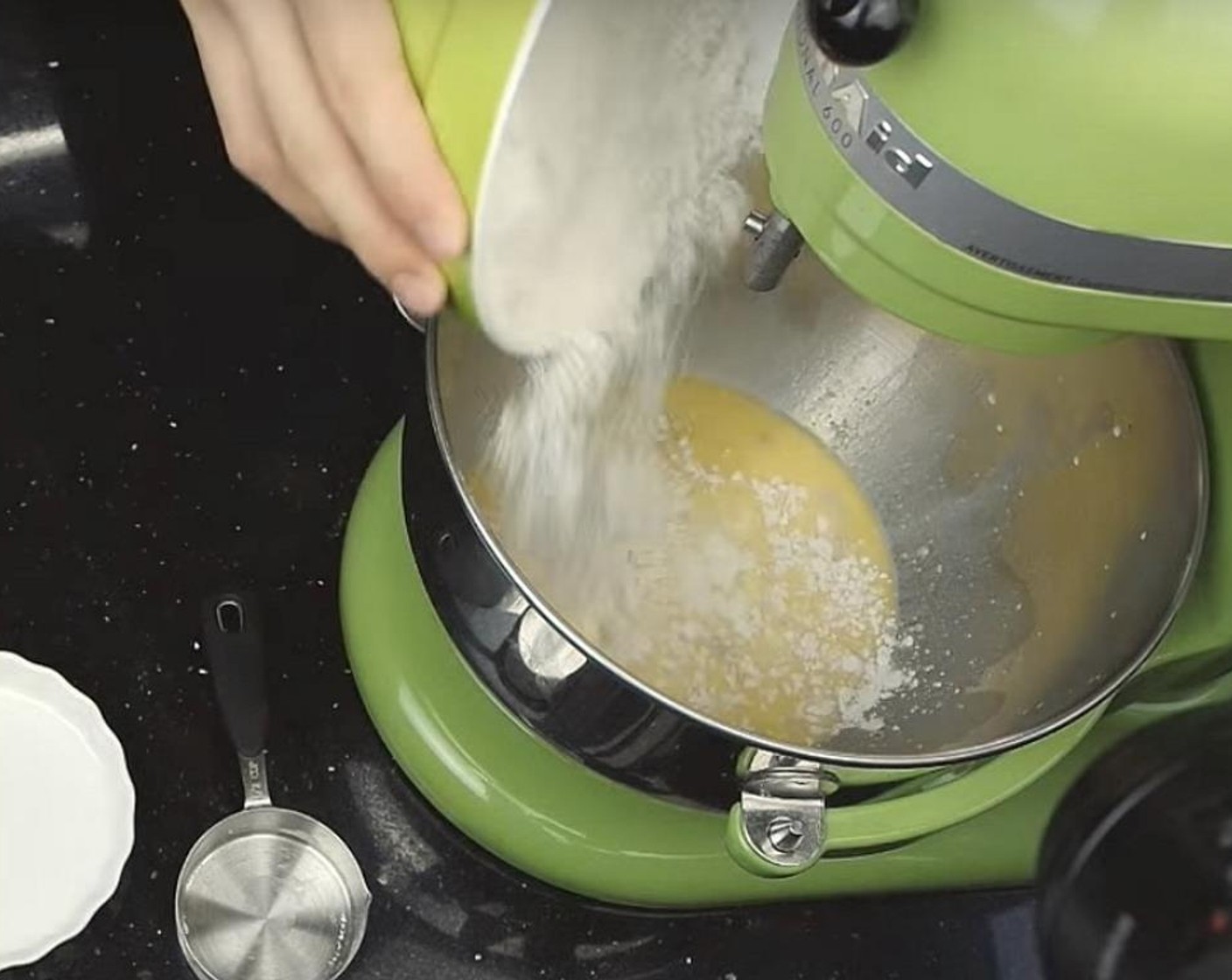 step 2 Next, add the Caster Sugar (1/4 cup), Bread Flour (2 cups), All-Purpose Flour (3/4 cup), and Salt (1/2 tsp).