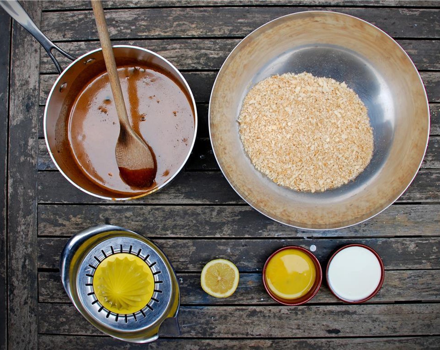 step 13 Immediately pour the golden syrup mixture onto the nuts and breadcrumbs and stir to combine, followed by the lemon juice, Egg (1) and Cream (1/3 cup).