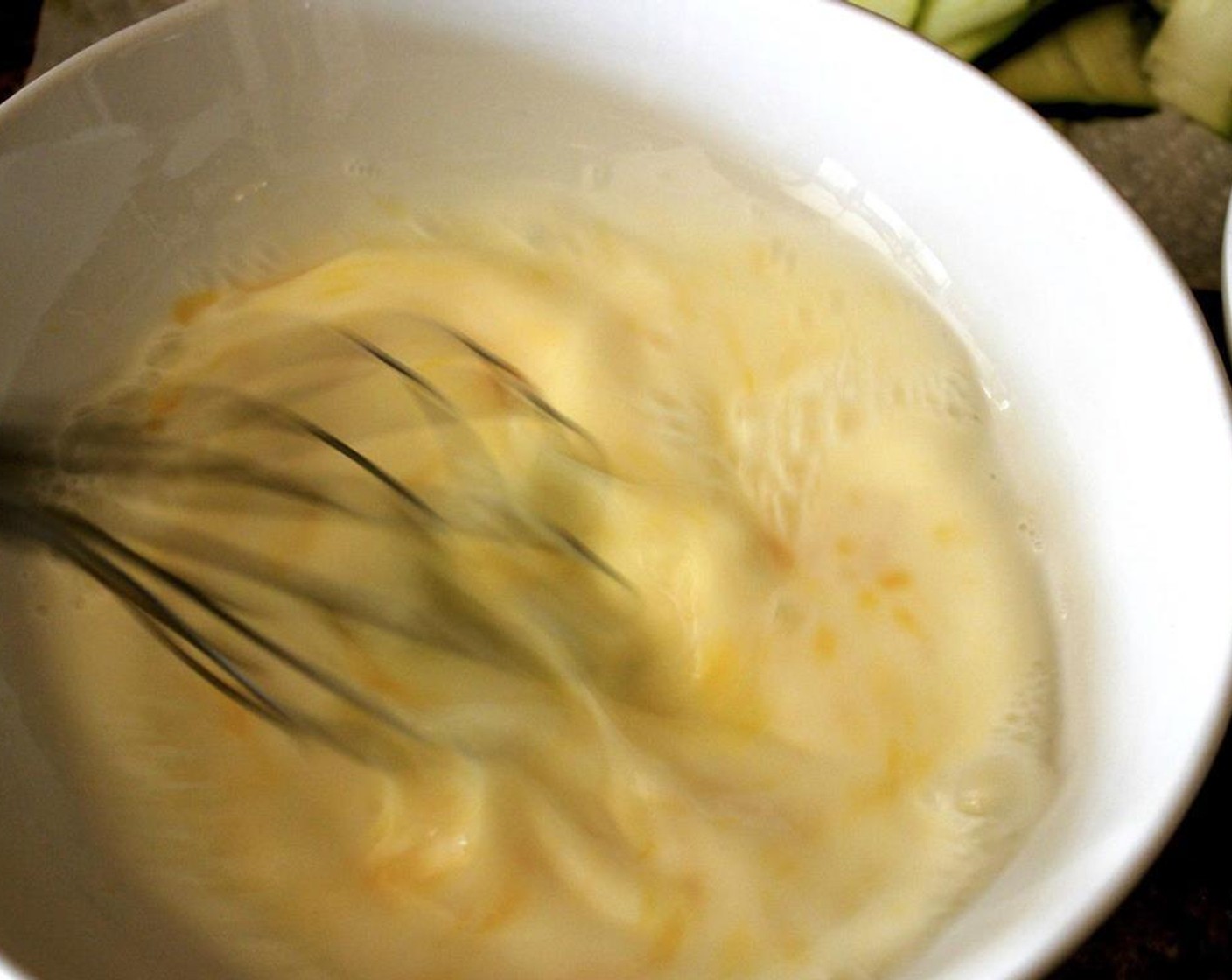 step 2 Mix the Egg (1) and Milk (1 cup) together in a bowl.