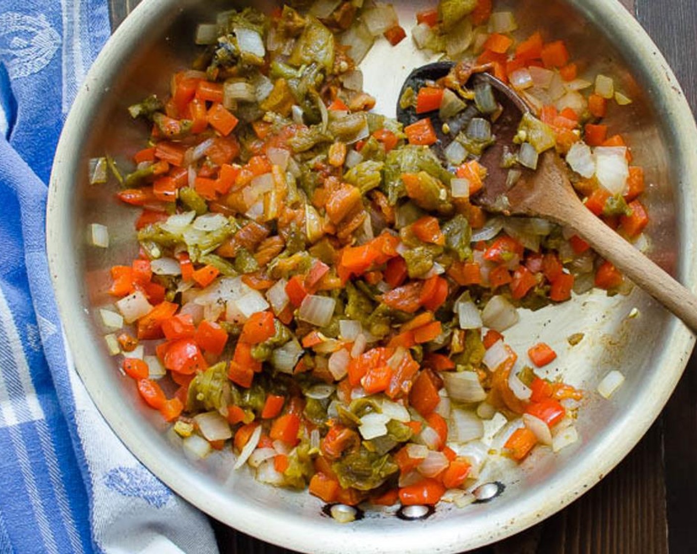 step 3 Saute the vegetables until softened, about 3 to 5 minutes. Add the Hatch Chili Peppers (1 1/2 cups) and continue to saute until most of the liquid has evaporated. Remove from heat.