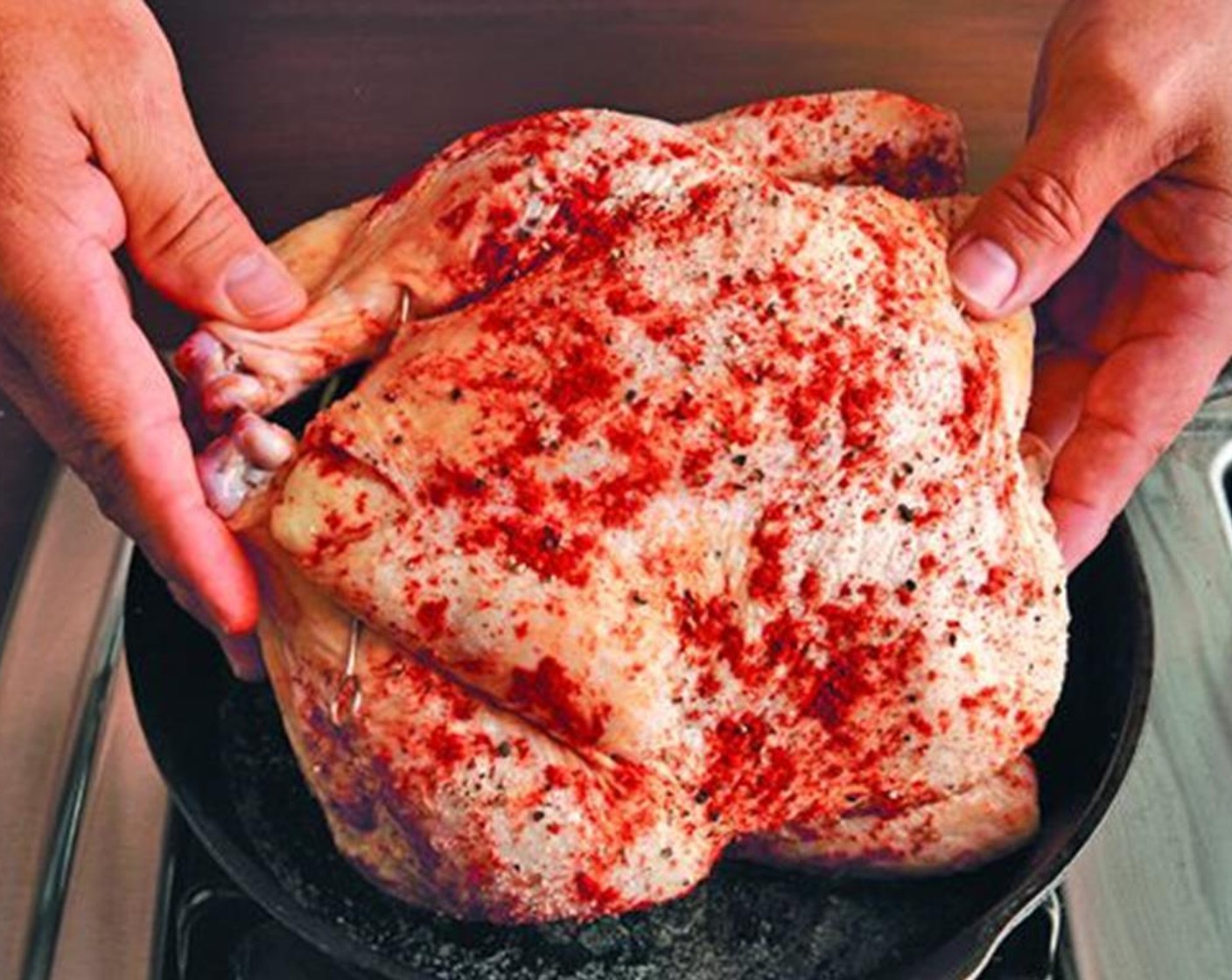 step 5 Rub the chicken all over with Butter (2 Tbsp) then sprinkle it with the Smoked Paprika (1/2 tsp), salt and pepper to taste.