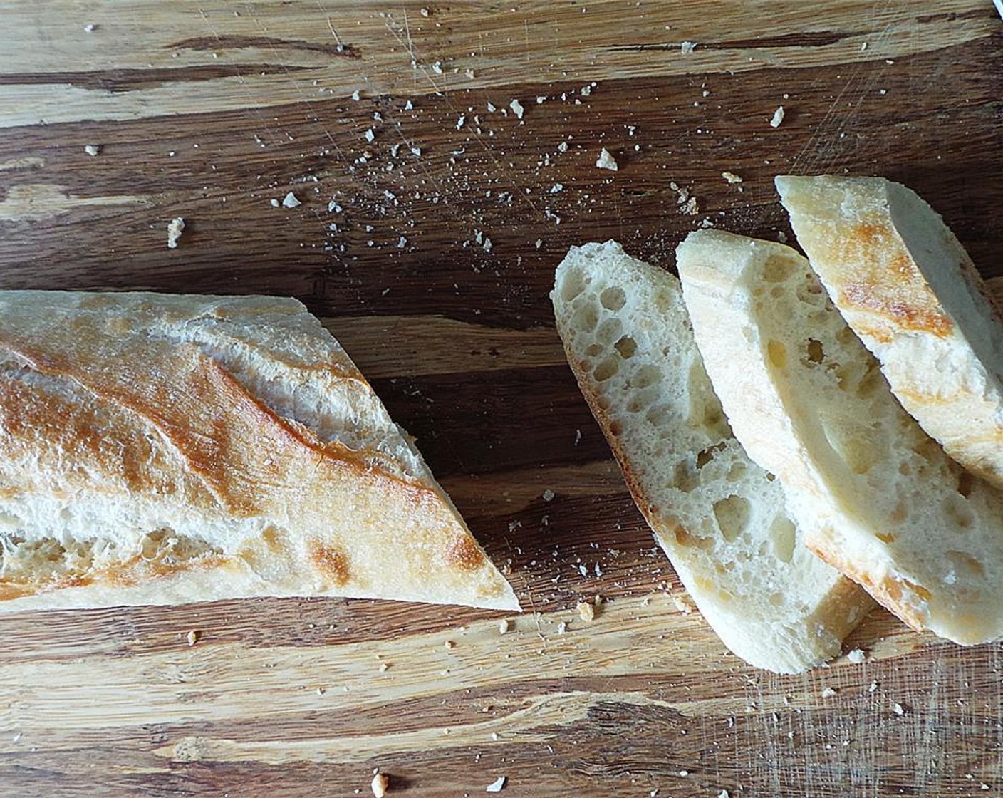 step 3 While onions cook, you can slice the Baguette (1).