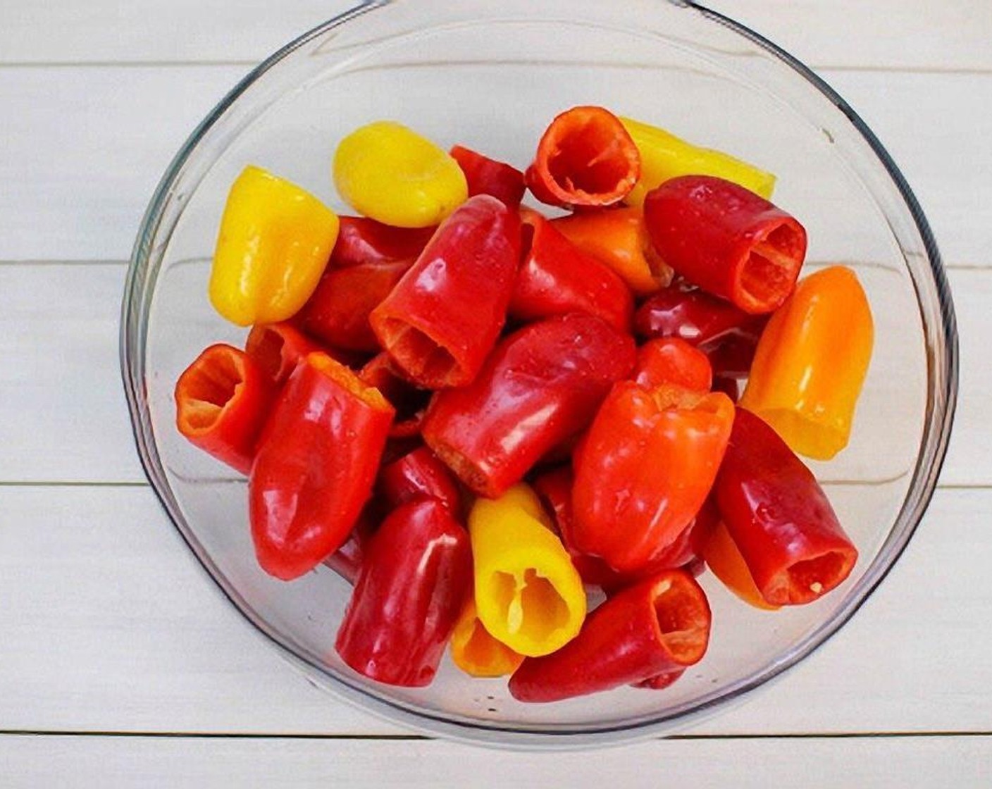 step 6 Cut the tops of the Mini Peppers (6 cups) and take out the seeds.