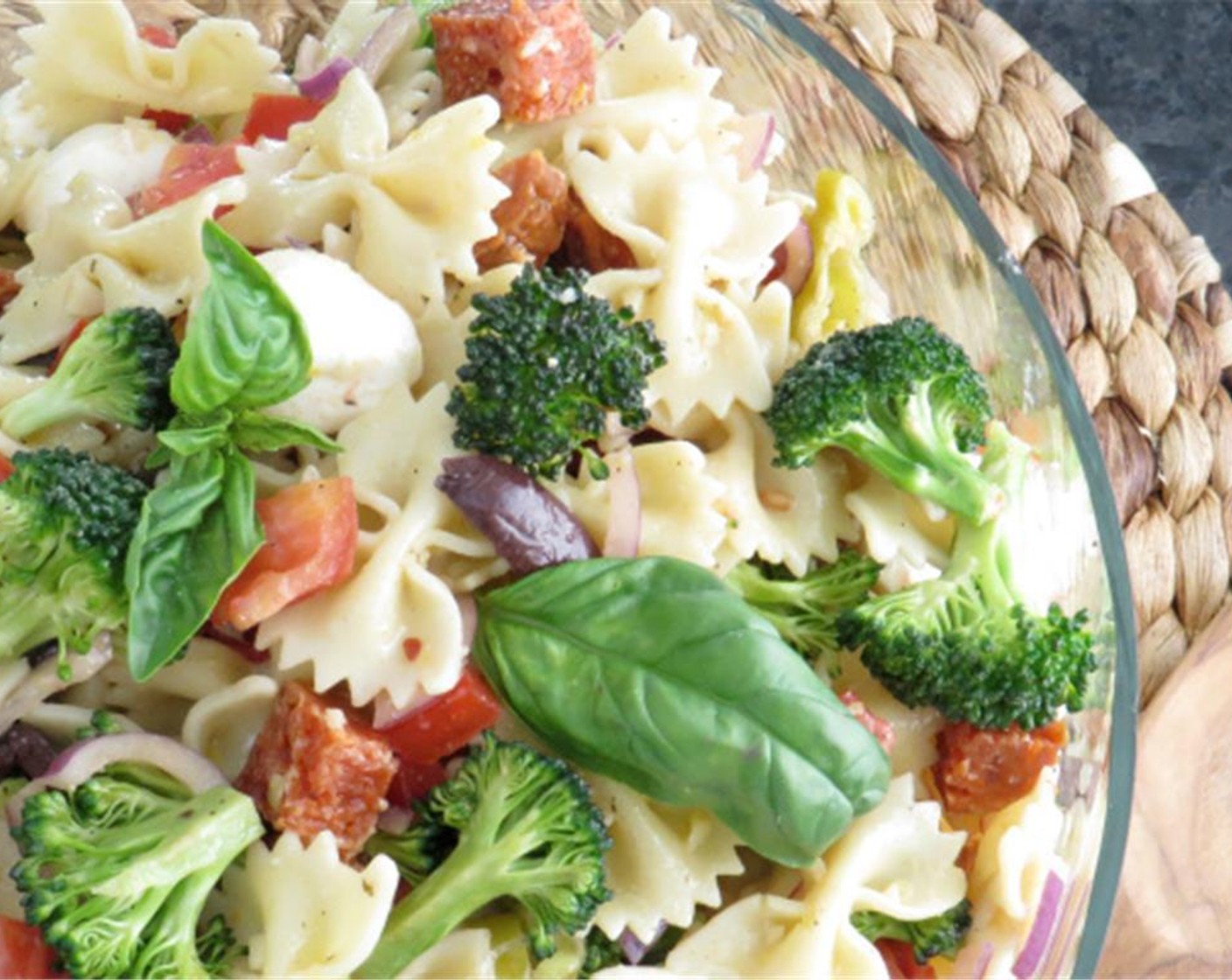 step 6 Add pasta to the vegetables. Toss to combine. Add dressing to salad and toss again. Refrigerate for several hours to allow the flavors to marry and broccoli to absorb some dressing and soften slightly. Toss with basil just before serving.
