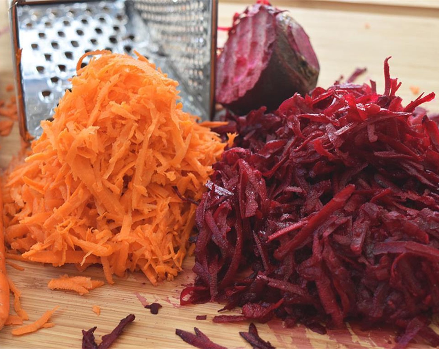 step 1 Shred the Beets (3) and Carrots (2) on a hand grater.