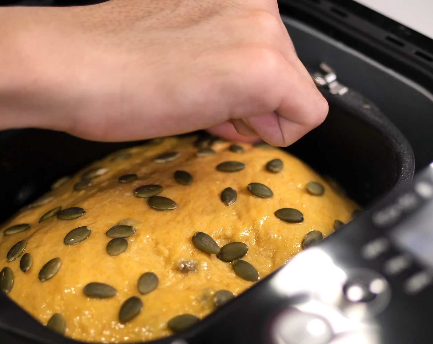 step 8 Then, for that perfect look, brush a lightly beaten Eggland's Best Classic Egg (1) mixed with 1 Tbsp water and sprinkle the Melon Seeds (1/2 cup).