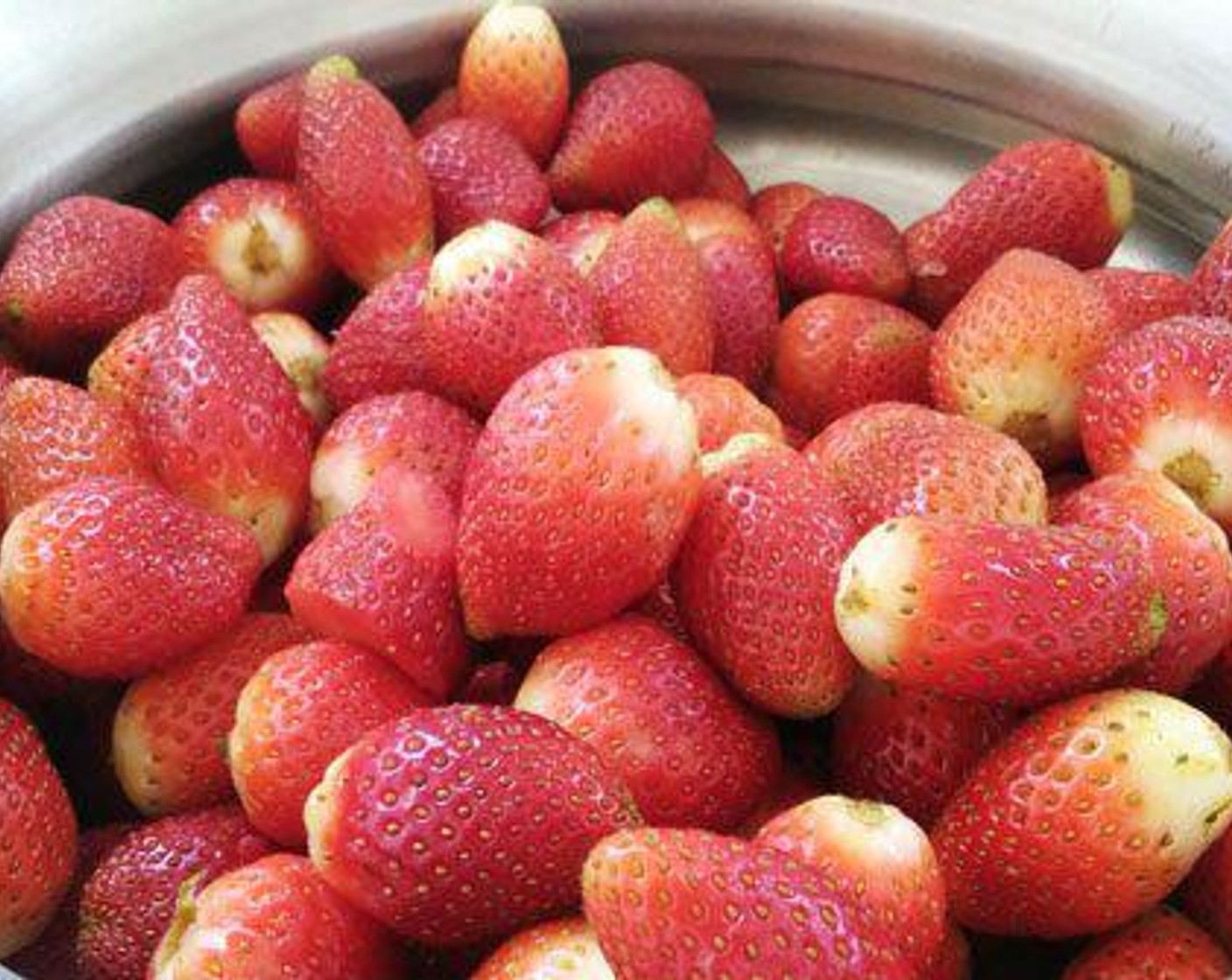 step 1 Wash Fresh Strawberries (10 cups) and let it dry. Chop each to four pieces. Take warm Water (1/3 cup) and add little sugar and add the Instant Dry Yeast (1/2 Tbsp) and mix well and let it to rise for some time.