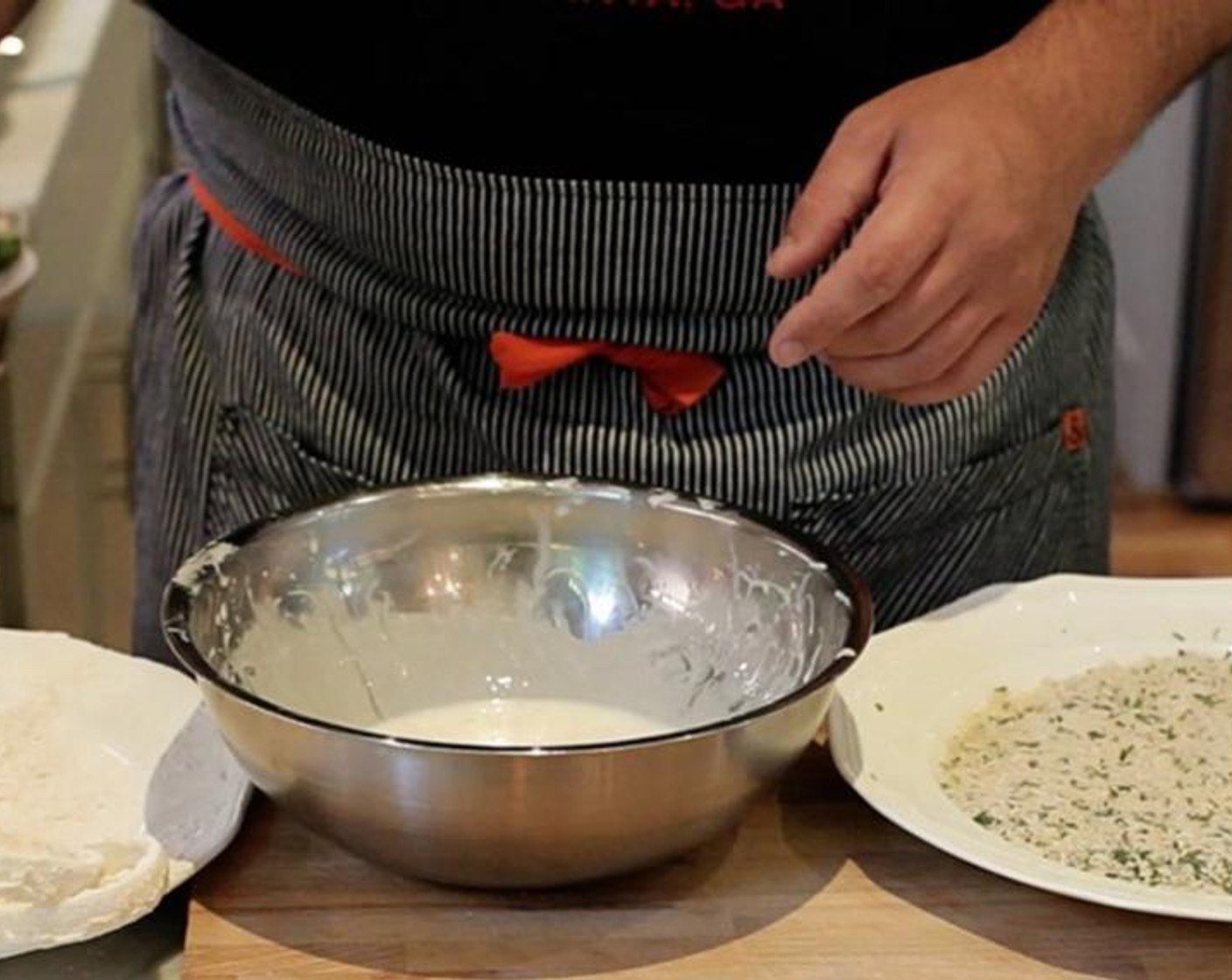 step 5 Use a fork to lift 1 onion ring out of the buttermilk, allowing the excess buttermilk to drip back into the bowl. Drop the ring into the All-Purpose Flour (1 cup) and turn to coat evenly. Repeat with remaining rings, stacking the coated rings along the edge of the flour plate.