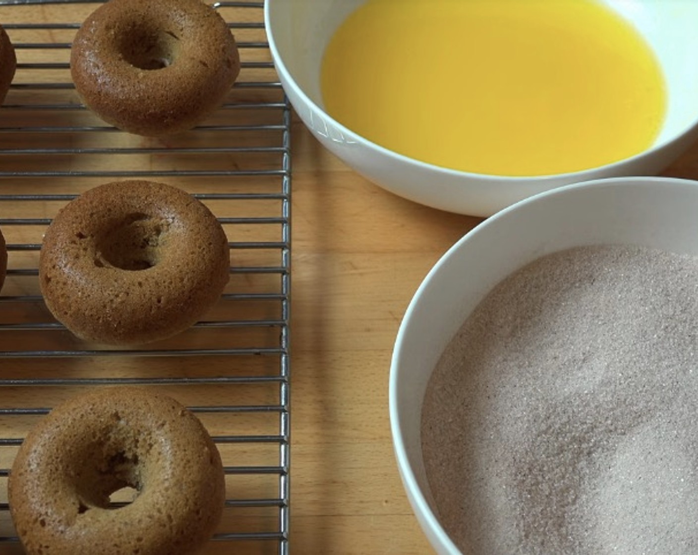 step 8 Dip each donut in Butter (3.5 oz) and coat in cinnamon sugar.
