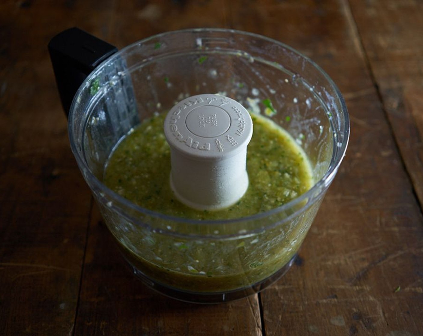 step 2 Place tomatillos, chiles, Yellow Onion (1), Garlic (1 clove), and Fresh Cilantro (6 sprigs) in a food processor. Blend until smooth, but retaining a little texture. Not liquified.