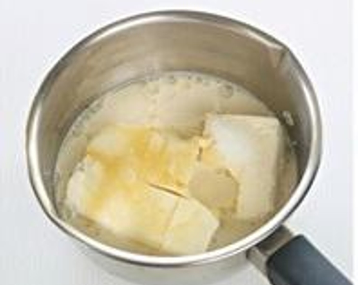 step 1 Place Philadelphia Original Soft Cheese (1 cup), Corn Oil (2 1/2 Tbsp), Caster Sugar (3 Tbsp), Honey (2 Tbsp) and Milk (1/3 cup) in a bowl under double boiler and stir mixture till melted. Then pass mixture through a sieve into a large bowl.