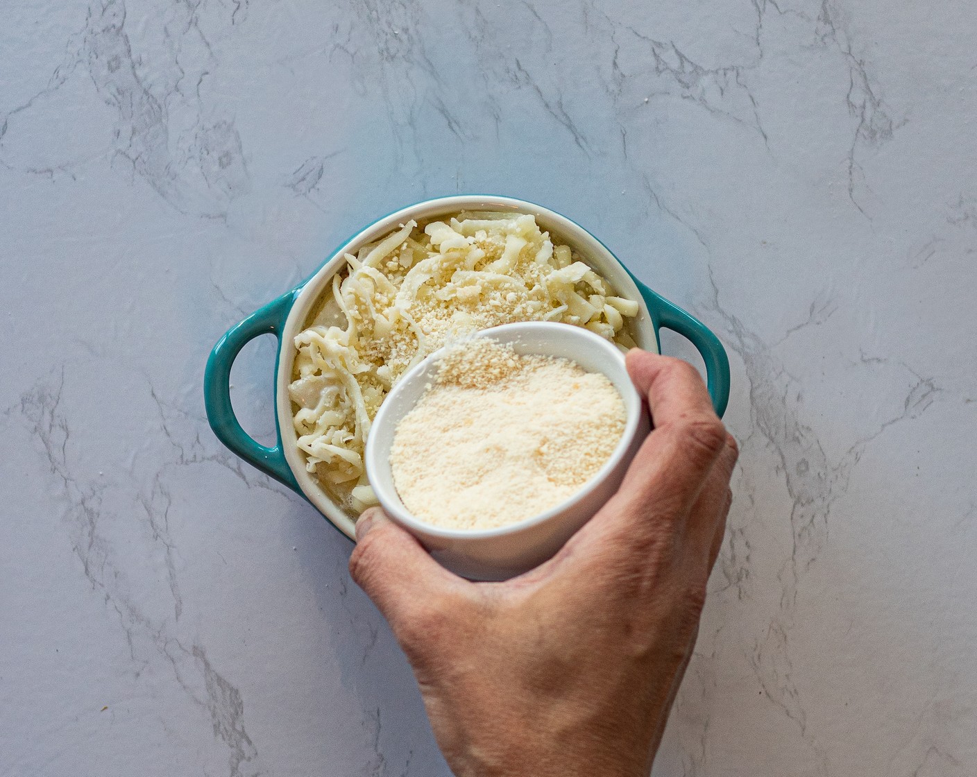 step 10 Finish off with 2 Tbsp of Grated Parmesan Cheese (1/2 cup) sprinkled over each casserole.