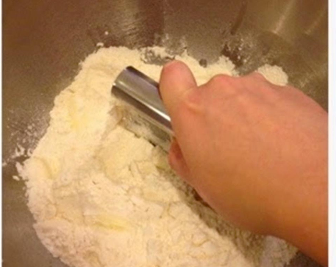 step 1 Sift the Self-Rising Flour (2 cups) and combine with the Salt (1 pinch) and Granulated Sugar (1 Tbsp). Cut the Butter (1/3 cup) into cubes and use a cutter to chop the butter into the flour until it becomes a fine crumble.