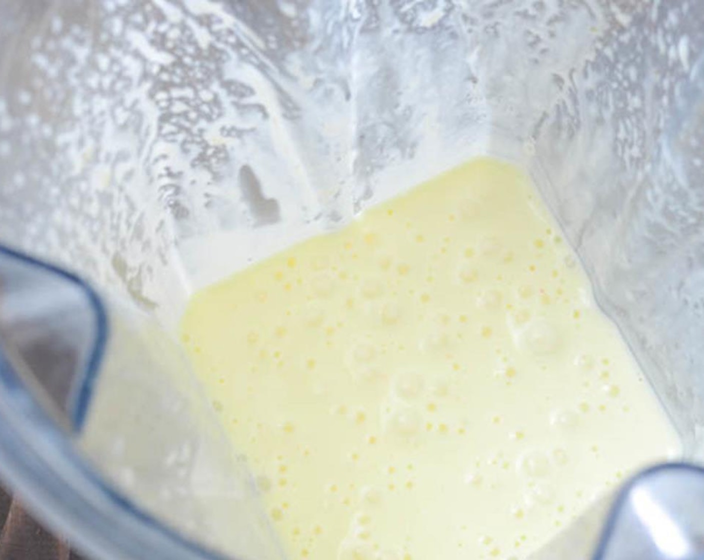 step 2 On medium high speed add the remaining 2/3 cup of Vegetable Oil (2/3 cup) in a slow drizzle through the top opening of the blender until thick and creamy. Set this "real mayonnaise" mixture aside.