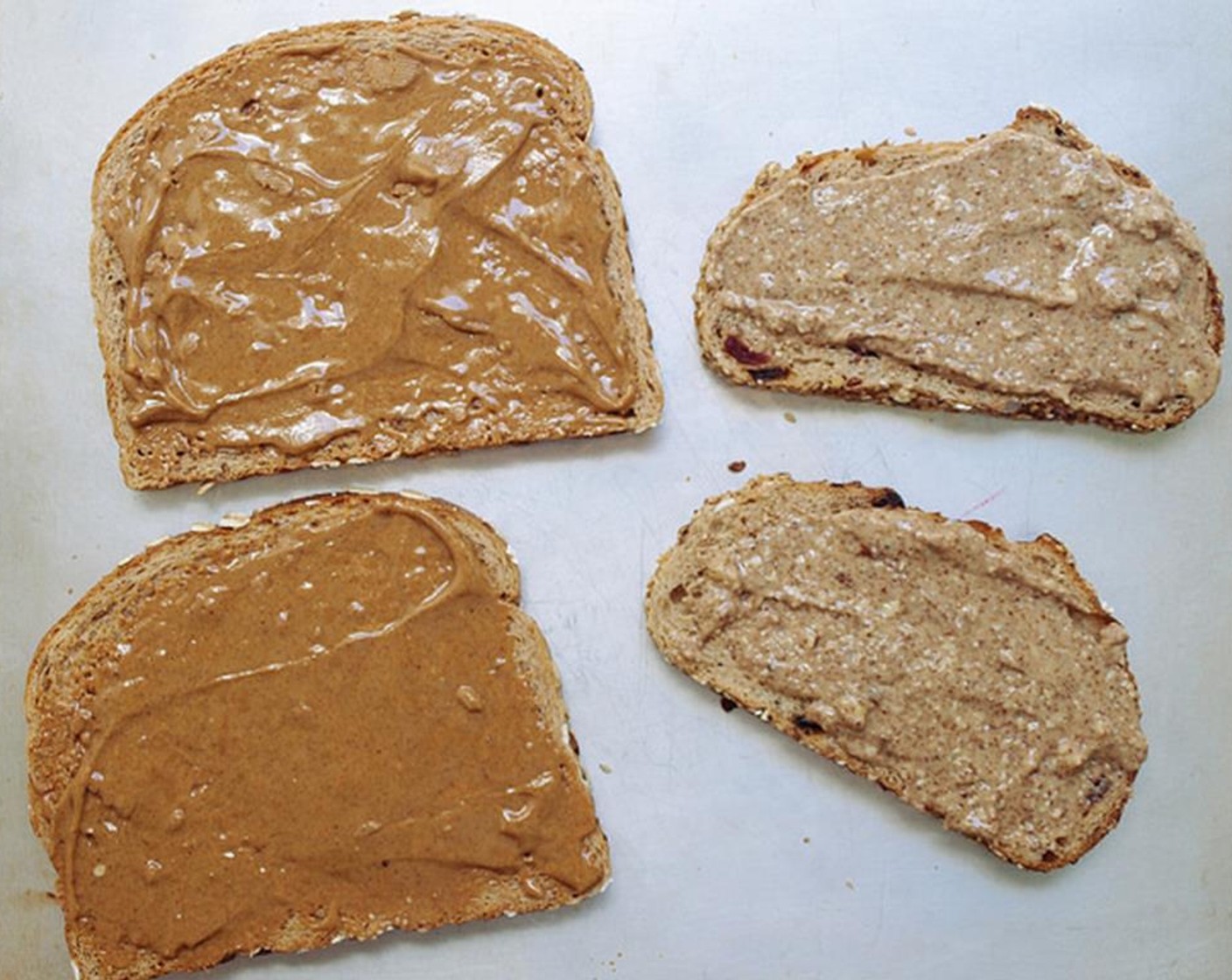 step 3 Add a nice layer of Nut Butter (to taste) to both slices of your Bread (4 slices).