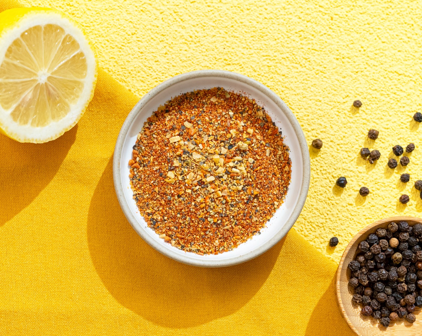 step 1 In a small mixing bowl, add the Dark Brown Sugar (2 Tbsp), Smoked Paprika (3 Tbsp), Coarse Salt (3 Tbsp), McCormick® Garlic Powder (2 Tbsp), Onion Powder (2 Tbsp), Ground Black Pepper (1 Tbsp), Baking Powder (1/2 cup), and Lemon Pepper (1 1/3 cups) together and mix well. Store in an air-tight container for up to 6 months in a cool, dry place.