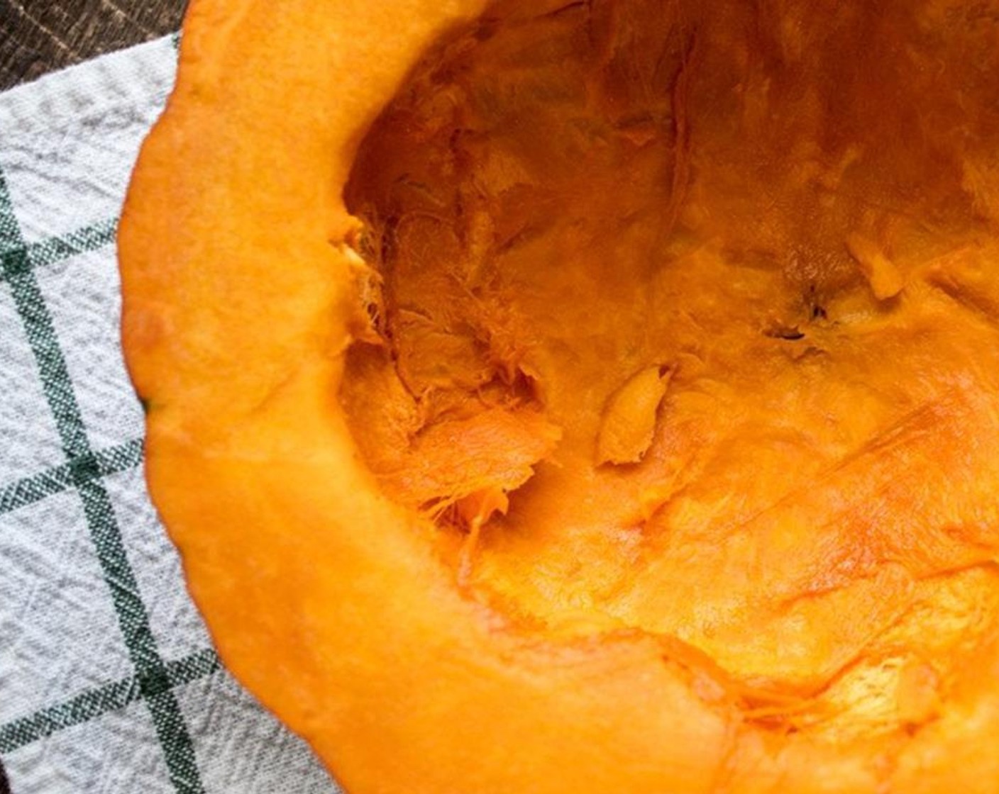 step 2 Cut Kabocha Squash (1 1/2 cups) in half, remove seeds, spray baking sheet with cooking spray and cook each side, flesh down, for 40-45 minutes or until flesh is fully cooked and very soft.