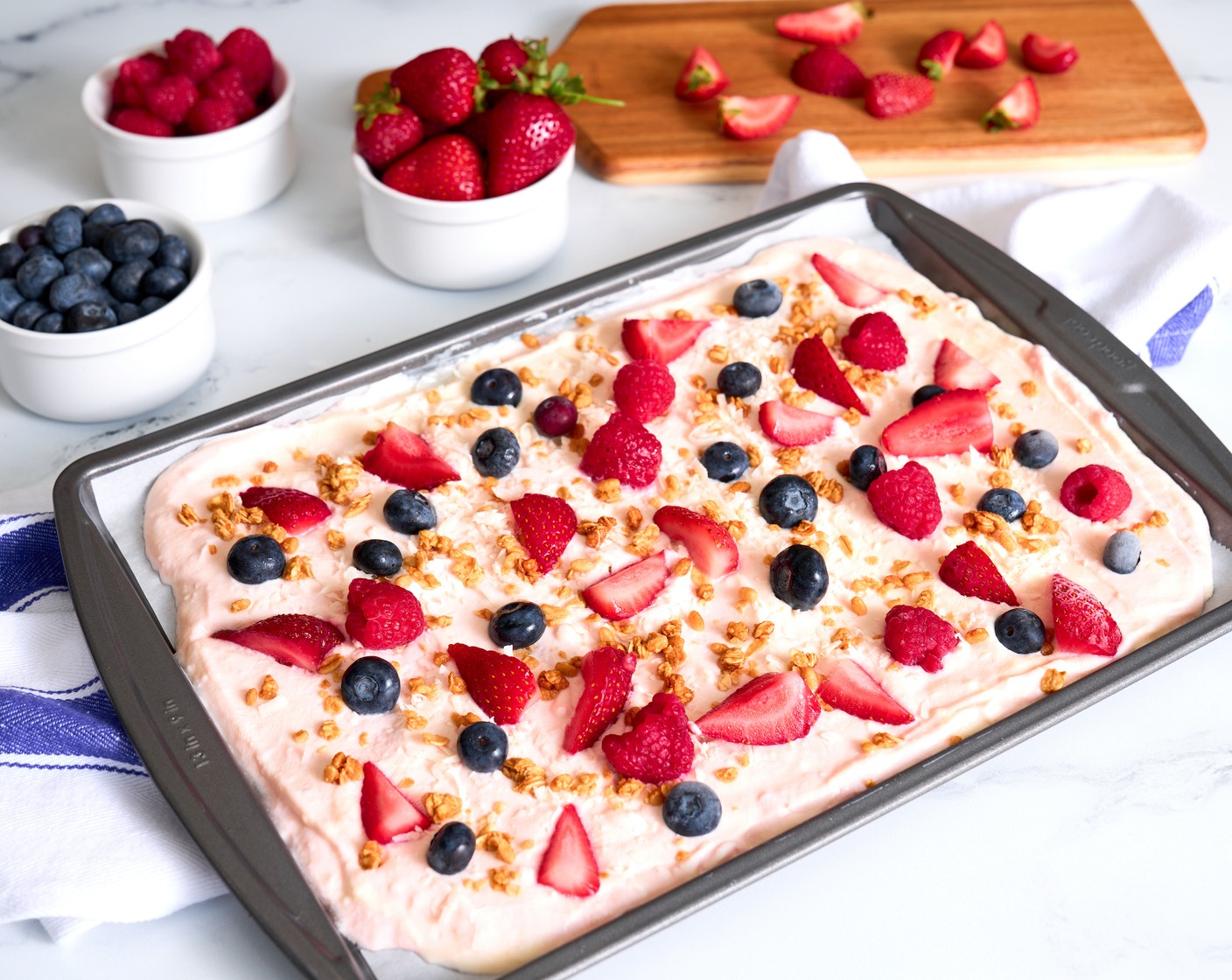 step 4 When the yogurt bark is firm, remove the parchment paper and cut or break it into pieces. Serve immediately.