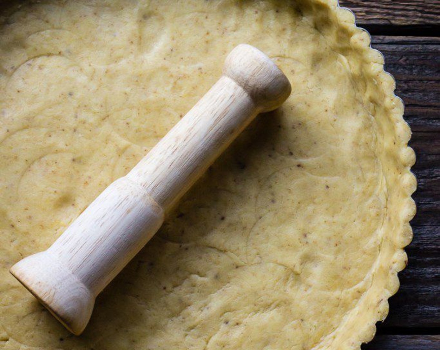 step 6 Evenly press dough into the bottom and up the sides of a 10.5-inch fluted tart pan with removable bottom.