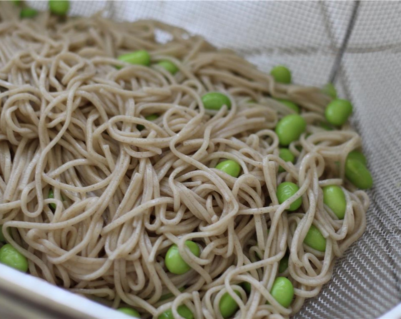 step 15 Drain and rinse the noodles and edamame in a colander.