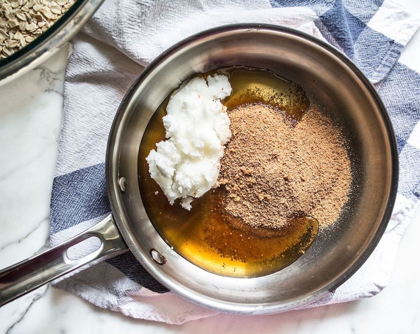 step 3 Heat Coconut Oil (1/3 cup), Maple Syrup (1/4 cup) and Coconut Sugar (1/4 cup) over low heat, stirring continuously until melted and well combined.