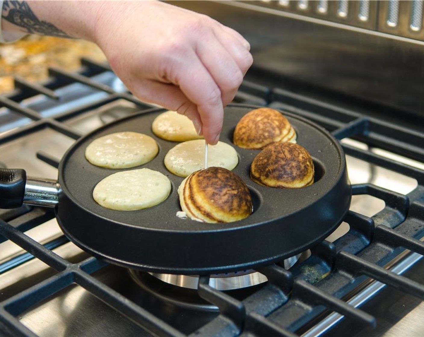 step 13 Turn over each aebleskiver using a fork or toothpick.