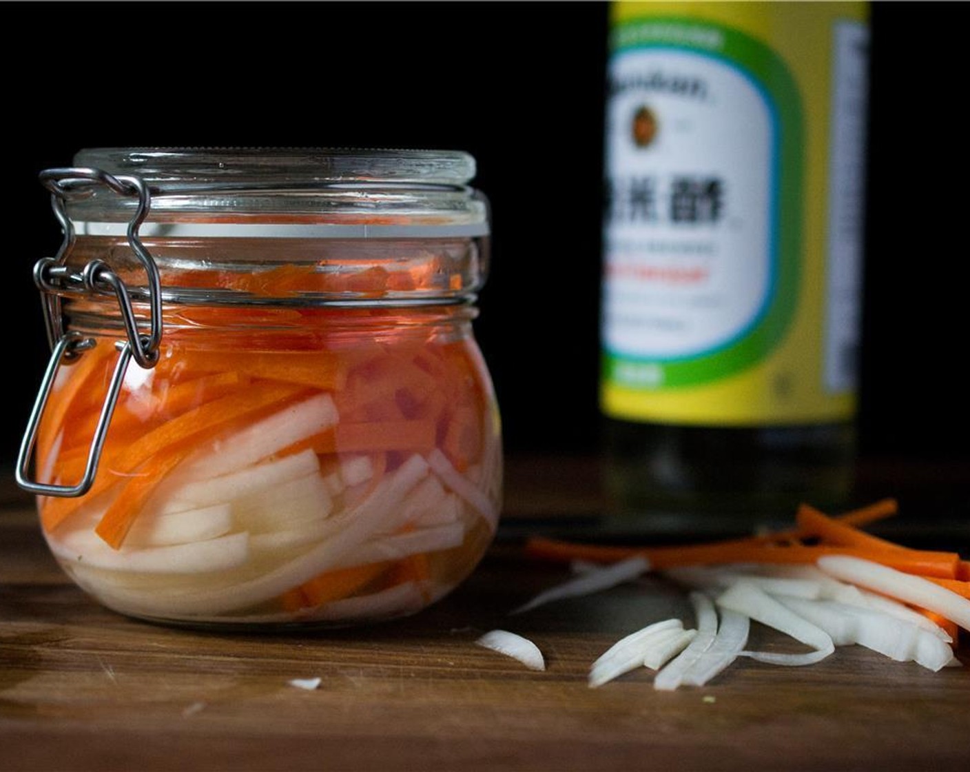 step 1 Prepare the Do Chua: In a sterile jar, combine the Rice Vinegar (1 1/4 cups), Salt (1 tsp), Granulated Sugar (1/2 Tbsp) and stir well. Add the Carrots (2) and Daikon Radish (1). Refrigerate until needed.