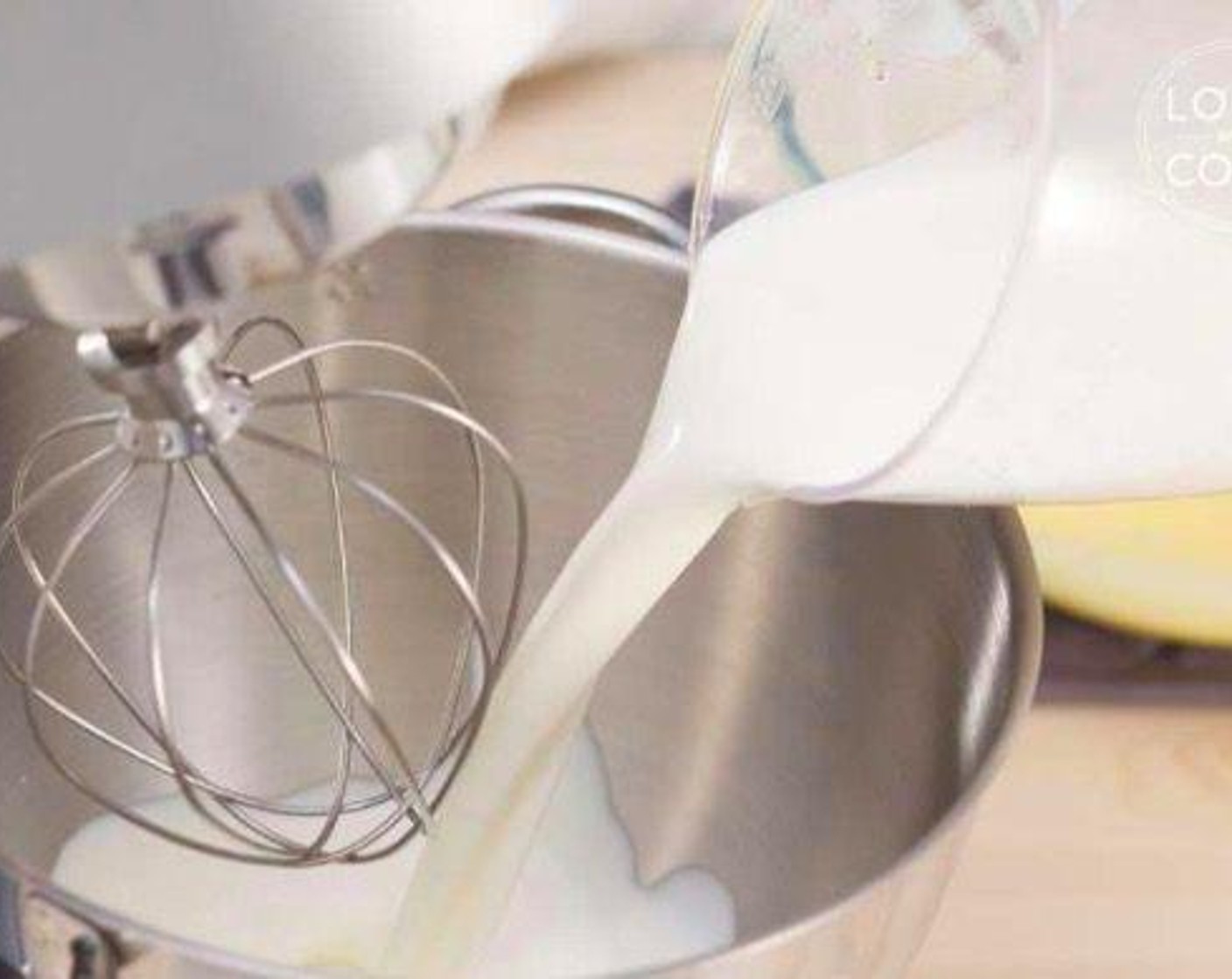 step 4 In another bowl, pour Kemps Heavy Whipping Cream (1 1/4 cups), Vanilla Essence (2 tsp), and Caster Sugar (1/3 cup).