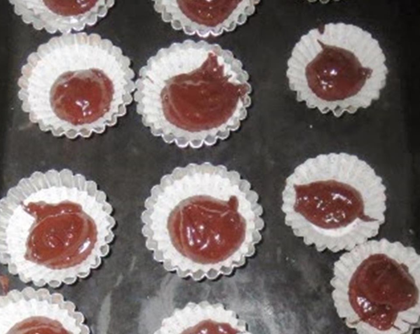 step 5 In each mini cupcake mold, fill halfway with brownie batter.